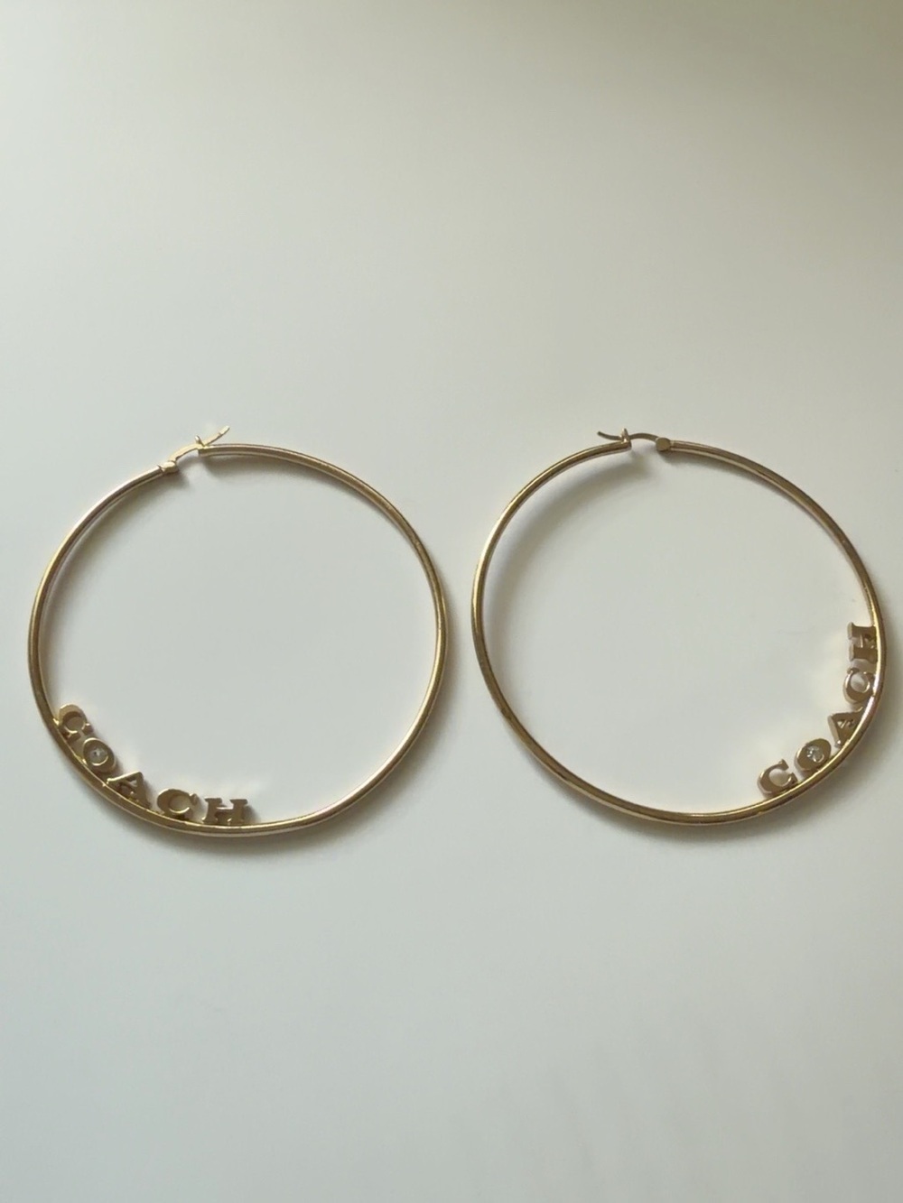 Coach Gold Letter Logo Hoop Earrings